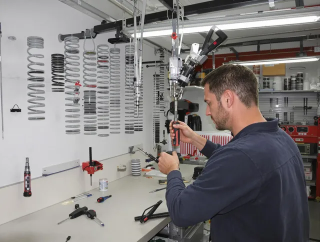 Brookfield Garage Door Repair safety certified technician performing precision spring replacement in Brookfield